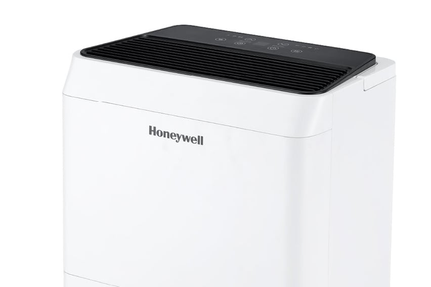 Honeywell white home dehumidifier with a black top control panel and water-level indicator.