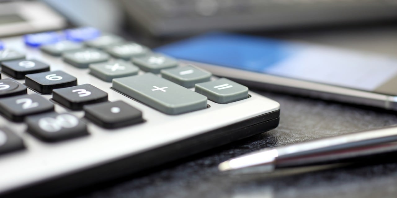Finance Calculator and pen